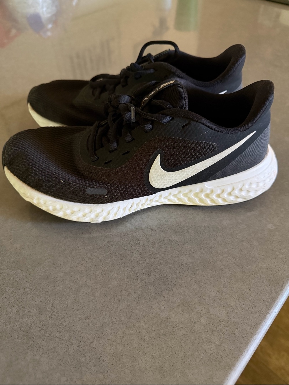 Nike Women's Black and White Revolution Running Shoes